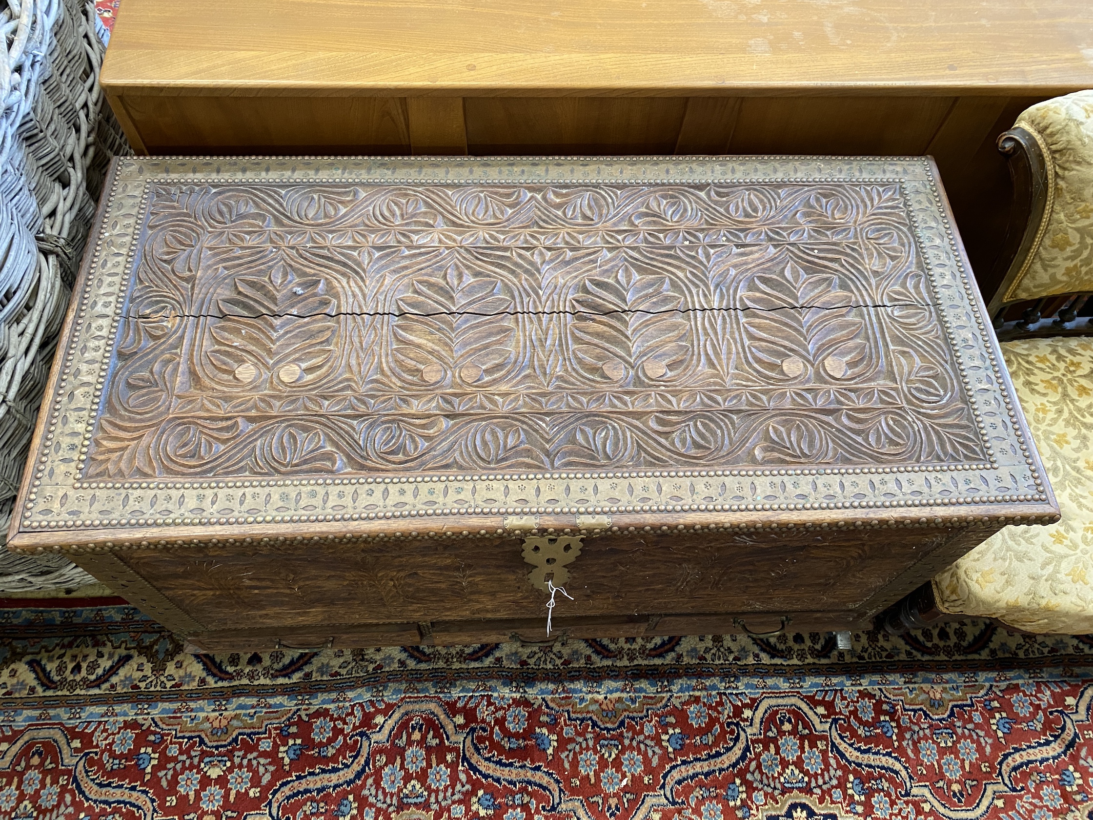 A brass mounted carved hardwood Zanzibar chest, width 110cm, depth 54cm, height 61cm